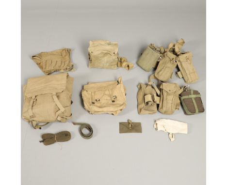 A set of webbing comprising a broad belt, two shoulder straps, two ammunition pouches, entrenching tool and handle and a wate