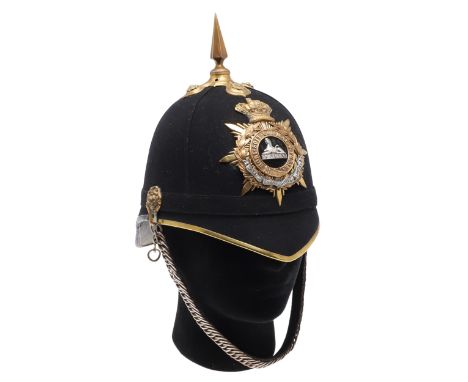 With a blue cloth covered body with brass fittings, six sided spike to the top on boss with foliate fixings, rosettes to eith