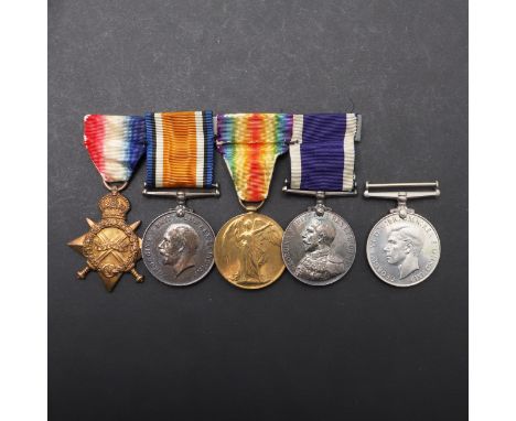 A group of four comprising 1914-15 Star named to P.O. 16190 Cpl C.W. Morgan R.M.L.I., War Medal and Victory Medal similarly n