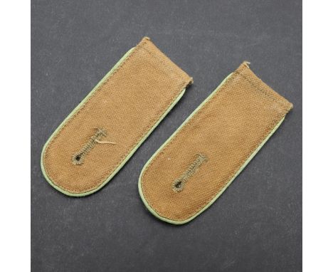 A pair of Afrikakorps Panzergrenadier's shoulder straps of pale sand coloured material with fieldgrey undersides and light gr