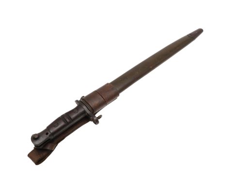 A 1917 pattern bayonet with a 43cm sharpened pointed blade with single fuller, marked '1917 Remington' With two part wooden g