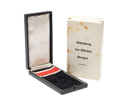 A presentation case for an Iron Cross type Knight's Cross, the outer thin cardboard box printed Ritterkreuz des Eisernen Kreu