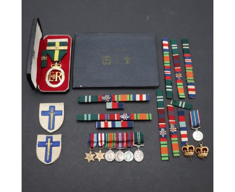An Elizabeth II Territorial Efficiency Medal dated 1966, with second award bar, in Royal Mint case of issue with uniform ribb