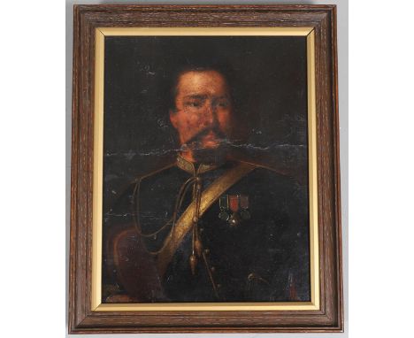 A portrait of a soldier in uniform wearing three medals for Crimea, Order of Medjidieh and Turkish Crimea. A sword hilt visib
