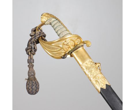 A fine sword with a 73 cm pointed, single edged blade with broad shallow fuller, the blade decorated with a fouled anchor and