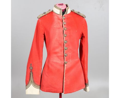 A scarlet single breasted tunic with buttons for the Worcester Regiment and the rank of 2nd Lieutenant. Eight buttons to the 