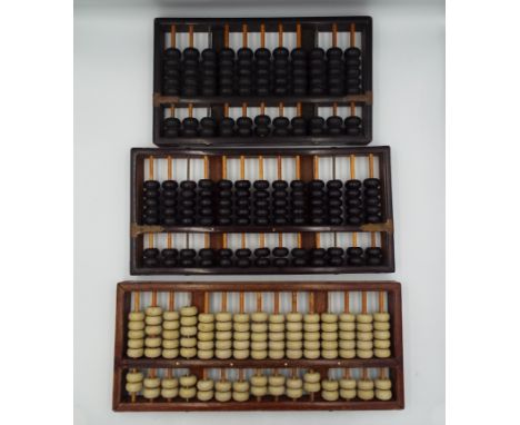A Chinese hardwood and jade abacus, 20th century, the metal plaque inscribed Flying Eagle', with inset bone roundels, 17.5 x 