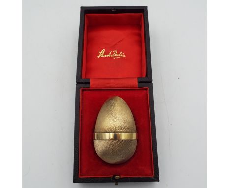 A Stuart Devlin silver, silver gilt and enamel surprise Easter egg with hedgehog amongst foliage interior decoration, numbere