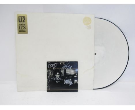 U2: 'Where The Streets Have No Name' signed CD single, card sleeve bearing autographs in silver pen of Bono, The Edge, Adam C