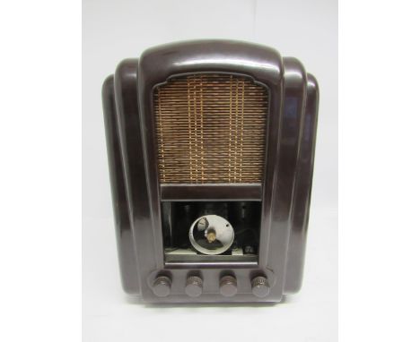 A Ferranti 145 three-band AC superhet valve radio in brown Bakelite case, c.1945. 45cm tall, missing glass station display pa