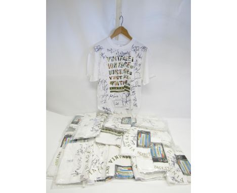 A large collection of 'Vintage TV' t-shirts, signed by various pop stars, TV personalities andb entertainers including Sherly