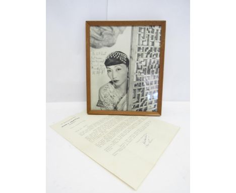 Anna May Wong (Chinese American actress 1905-1961) - A signed and dedicated black and white photograph of Wong Liu-Tsong, kno