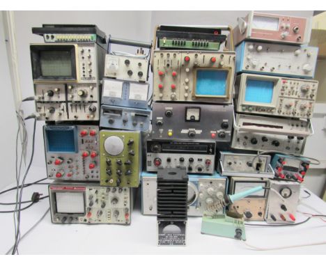 A collection of electrical testing and maintenance equipment including various oscilloscopes, Green 2601 termination wattmete