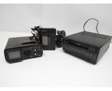 A Sony EV-C3E Video 8 video cassette recorder, a JVC P-1000UKC portable TV/radio and a Sony WM-B12 personal cassette player (