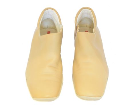 A pair of Prada leather ankle boots, cream, with zip fastening, size 36. With maker's box.Condition report: Overall condition