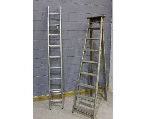 20th Century folding pine ladder, together with an aluminium extending ladder, 222cm and 242cm high, not extended (2)