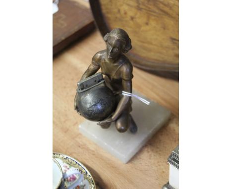 Art Deco table lighter, modelled as a kneeling female figure holding an orb form lighter, on an onyx base, 17.5cm high