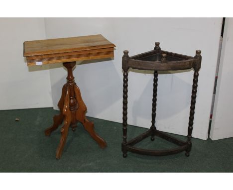 Light oak occasional table raised on pierced legs, oak corner stick stand (2)