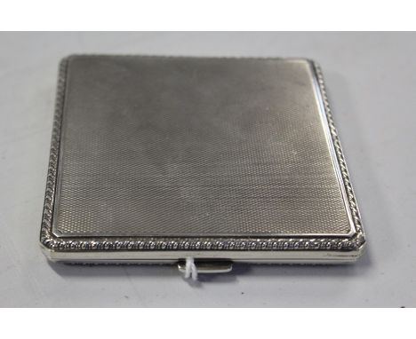 George VI silver cigarette case, Birmingham 1937, maker Cohen &amp; Charles, with engine turned exterior, gadrooned border an