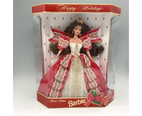 New in Box. Dressed in festive red and white gown with lace and gilt accents. Flowing hair offset with matching tiara. This i