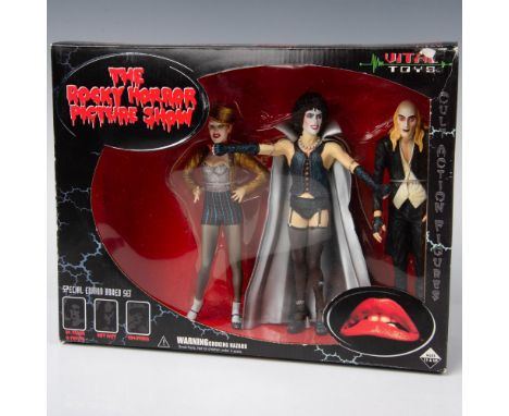 New old stock. A special edition boxed set with three characters from the 1975 musical comedy horror film, The Rocky Horror P