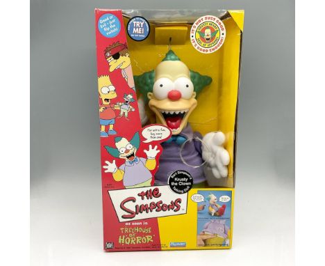 New in original box. Battery operated Simpson character from Treehouse of Horror talking doll. Playmates Toys Inc. backstamp.