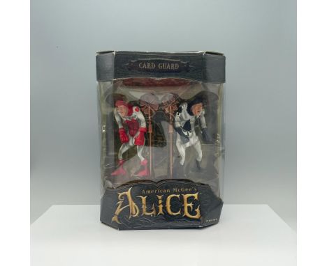Capture the essence of American McGee's Wonderland with the iconic Card Guards. One features a striking red heart design, whi