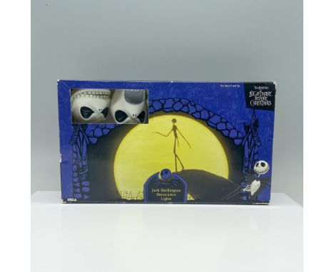 A string of 10 decoration lights made in the image of Jack Skellington's head making a scary smile or horrific open mouth in 