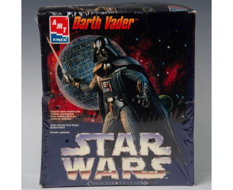 This collector's edition model features a highly accurate sculpt of Darth Vader, capturing his iconic armor, helmet, and ligh