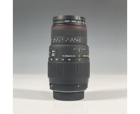 For Canon SLR cameras. 70 - 300mm F/4 - 5.6 lens with Hoya Alpha MC UV 58mm filter. Includes original lens manual and Sigma c