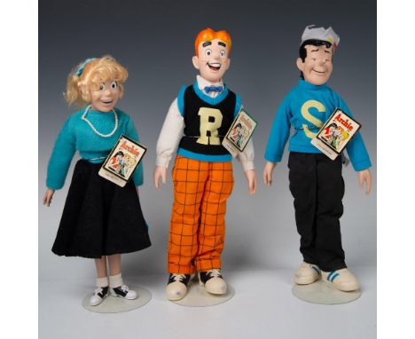 Experience retro charm with this Hamilton Gifts Presents Archie Doll set, which includes Archie (P3900), Betty (P3903), and J