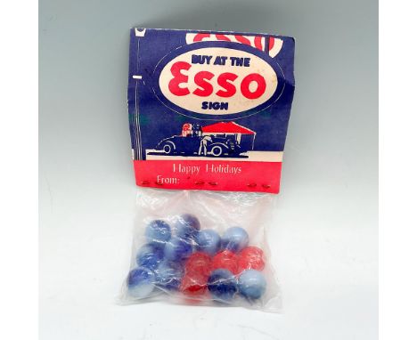 An unopened and original Esso bag. Contains 14 marbles; red, white, and blue coloration. Bag size: 3.25"L x 0.5"W x 6.25"H. I