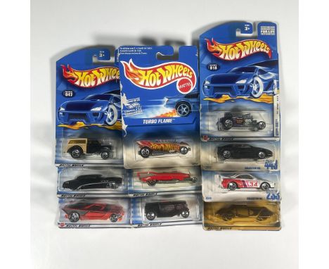 A set of 10 Hot Wheels cars, 6 First Edition and 4 standards that includes the Turbo Flame (Collector #369), the Ferrari 348 