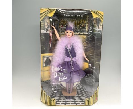 New in Box, Second in a Series. Representing great fashions of the 20th Century 1920's. Dressed in lilac layered Art Deco dre