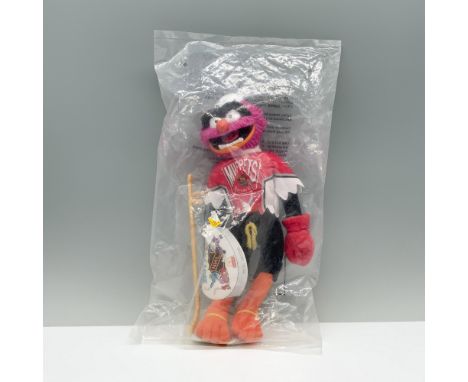 A plush of Animal from the Muppets in a red, gray, and black jersey with text that reads Muppets NHL Conference alongside a h