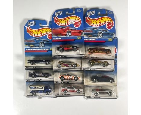 A set of 11 Hot Wheels toy cars that consist of the Flashfire (Collector #140), Speed Machine (Collector #1088), Power Pipes 