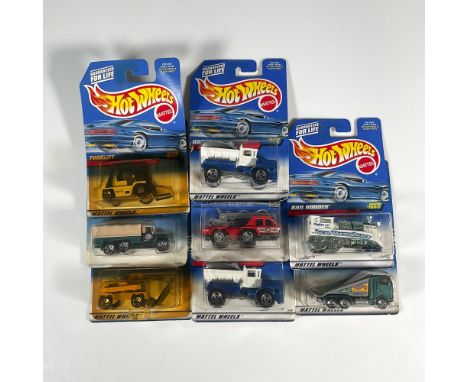 A set of 8 Hot Wheels toy consisting of the Flame Stopper (Collector #761), a pair of the Oshkosh P-Series (Collector #765), 