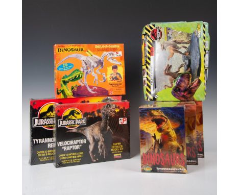 Two Lindberg Jurassic Park JP kits, featuring the Tyrannosaurus Rex Model No. 70271 UPC: 024225702716 and Velociraptor Model 