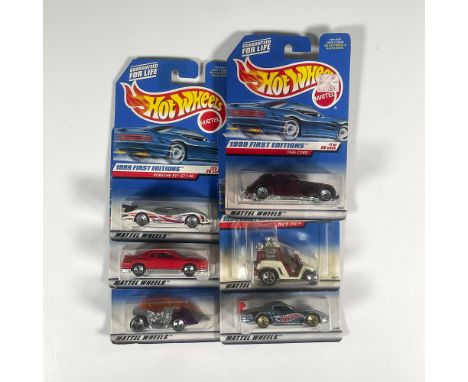 A set of 6 Hot Wheel toy cars that consist of the Monte Carlo Concept Car (6 of 26), the 1936 Cord (1 of 26), the Olds Aurora