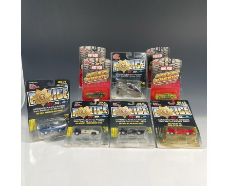 A set of 9 Racing Champion diecast cars is composed of 4 vehicles from the Street Wheels Series and 5 from the Police U.S.A S