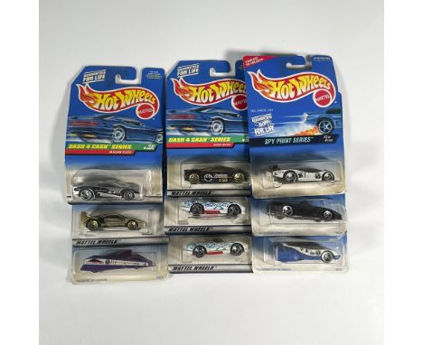 A set of 9 Hot Wheels toy cars, with 4 from the Spy Print Series, and 5 from the Dash 4 Cash Series. The Spy Print Cars inclu