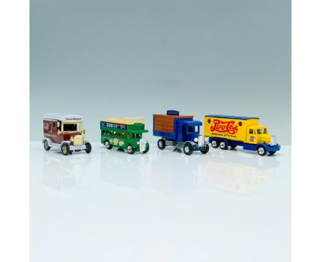 A collection of 4 vintage toy vehicles that consist of an ice cream truck, a zoo safari tour vehicle, a U.S post office truck