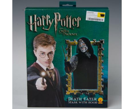 New old stock. A flexible vinyl mask created for the Warner Bros. film, Harry Potter and the Order of the Phoenix. Dress like