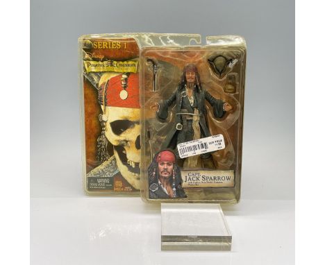 This figurine includes cutlass, rum bottle, compass, pistol, and hat. This item is sealed in its original box which measures 