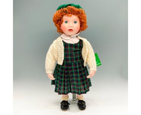 New in original box - Porcelain doll with red hair and freckles dressed in plaid dress, green beret, cardigan and patent leat