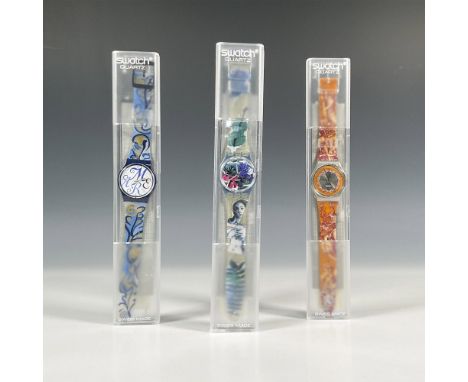 Three Swatch watches in quartz movement, all in original hard plastic cases with folded information sheets including Poeta GP