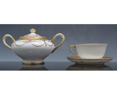 Noritake tea service, decorated with rose buds and swags, comprising teapot 14cm, sucrier, milk jug and four cups and saucers