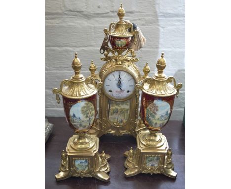 French style gilt metal and porcelain three piece clock garniture, enamel dial signed Imperial, cylinder movement, striking o