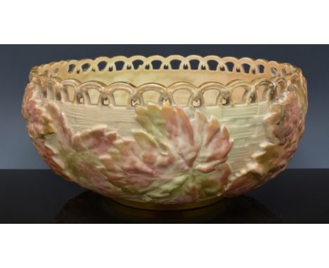 Royal Worcester fruit bowl, probably 1891, moulded with leaves against a basket weave ground, no. 1004, diameter 24cm.