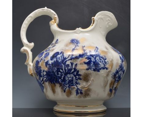 Staffordshire toilet jug, floral decoration in under glaze blue, 28cm, a basin and another jug (3).